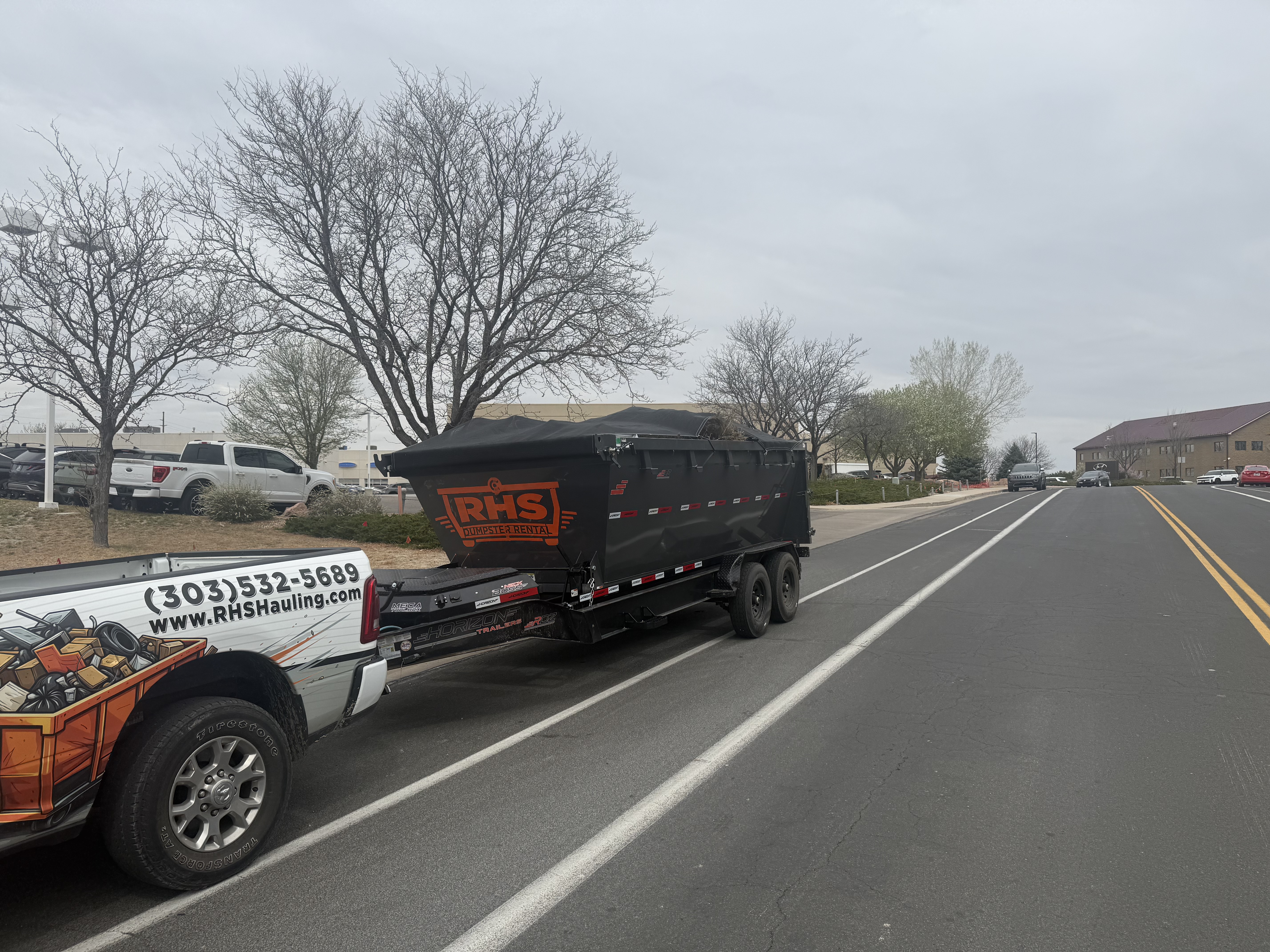 RHS dumpster on residential street